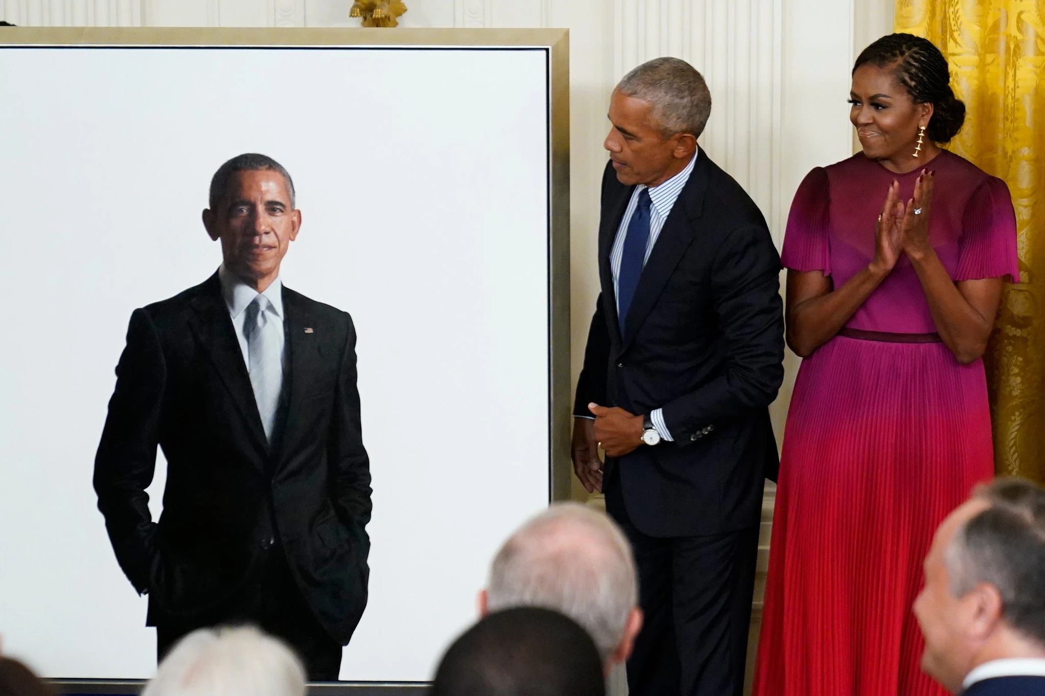 Former President Barack Obama looks at his Official White House Portrait with former First Lady Michelle Obama during a ceremony in the East Room of the White House Wednesday, September 7, 2022 in Washington.